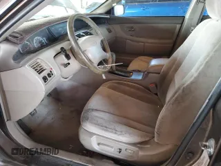 2000 Toyota Avalon XL z VIN 4T1BF28B3YU045264, wystawiony jako Copart lot #57519185 z przebiegiem 157 113 mil mil oraz Szkoda całkowita • Salvage title. Historia ofert i sprzedaży dostępna na DreamBid. Obrazek 7.
