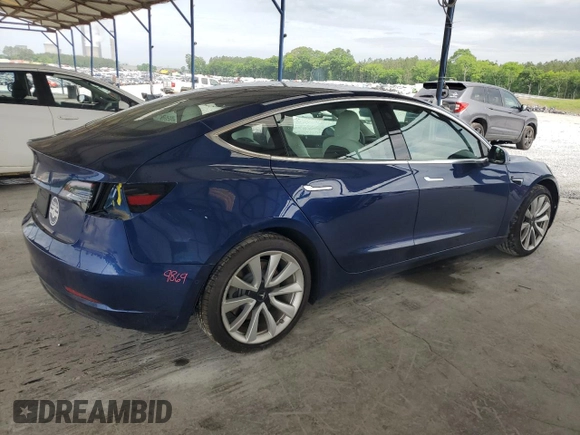 2019 Tesla Model 3 Mid Range z VIN 5YJ3E1EA1KF417900, wystawiony jako Copart lot #55310265 z przebiegiem 45 739 mil mil oraz Szkoda całkowita • Salvage title. Historia ofert i sprzedaży dostępna na DreamBid. Obrazek 3.