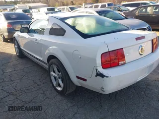 2005 Ford Mustang Deluxe with VIN 1ZVFT80N955183109, listed as a IAAI auction lot 41827964 with 151,774 mi miles. Bid and sale history available at carsss.com. Image 3.