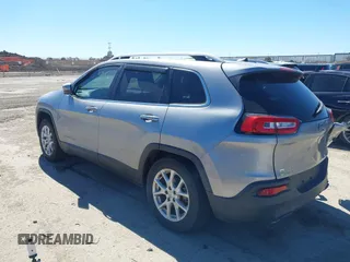 2016 Jeep Cherokee 75th Anniversary with VIN 1C4PJLCB1GW217638, listed as a IAAI auction lot 41689623 with 124,630 mi miles and . Bid and sale history available at DreamBid. Image 3.