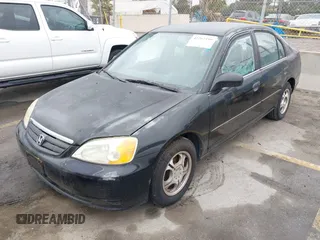 2001 Honda Civic LX with VIN JHMES16571S010117, listed as a IAAI auction lot 42207199 with 194,825 mi miles and . Bid and sale history available at DreamBid. Image 2.