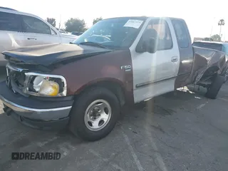 2000 Ford F-150 XL with VIN 1FTRX17L2YNB78032, listed as a IAAI auction lot 41687215 with 1 mi miles. Bid and sale history available at carsss.com. Image 16.