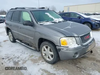 2007 GMC Envoy SLE with VIN 1GKDT13S072246688, listed as a IAAI auction lot 41258265 with 218,001 mi miles. Bid and sale history available at carsss.com. Image 1.