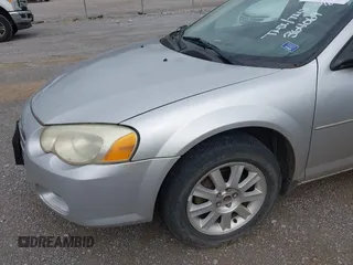 2004 Chrysler Sebring LX z VIN 1C3EL46X44N364069, wystawiony jako IAAI lot #42467873 z przebiegiem 153 241 mil mil oraz . Historia ofert i sprzedaży dostępna na DreamBid. Obrazek 6.