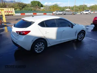 2014 Mazda 3 i Touring with VIN JM1BM1L77E1117166, listed as a IAAI auction lot 41336048 with 88,808 mi miles and . Bid and sale history available at DreamBid. Image 4.