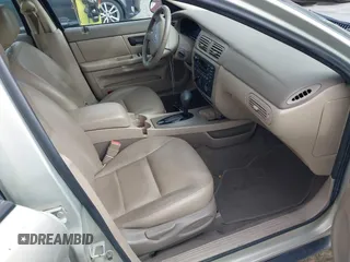 2004 Ford Taurus SES with VIN 1FAFP55U94A108654, listed as a IAAI auction lot 41585381 with 98,843 mi miles and . Bid and sale history available at carsss.com. Image 5.