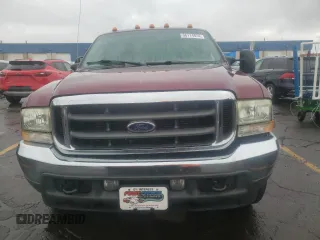 2004 Ford Super Duty F-250 XL with VIN 1FTNX20S84EA85791, listed as a Copart auction lot 66114974 with 223,674 mi miles and Salvage Title. Bid and sale history available at carsss.com. Image 5.