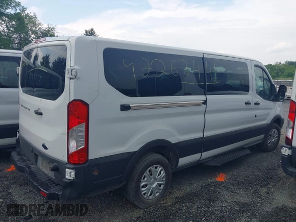 2019 Ford Transit Passenger XL with VIN 1FBZX2YM6KKA34848, listed as a IAAI auction lot 42263441 with 282,788 mi miles and . Bid and sale history available at DreamBid. Image 13.