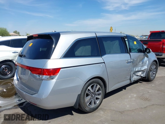 2014 Honda Odyssey Touring с VIN 5FNRL5H98EB070983, выставлен на аукционе IAAI как лот 42328380 с пробегом Не указан миль и . История ставок и продаж доступна на DreamBid. Изображение 4.