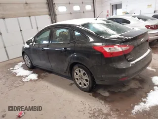 2012 Ford Focus SE with VIN 1FAHP3F2XCL414212, listed as a IAAI auction lot 41472826 with 162,025 mi miles. Bid and sale history available at carsss.com. Image 3.