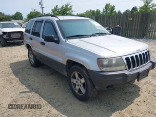 2003 Jeep Grand Cherokee Laredo z VIN 1J4GW48S83C558962, wystawiony jako IAAI lot #42415803 z przebiegiem 312 419 mil mil oraz . Historia ofert i sprzedaży dostępna na DreamBid. Obrazek 1.