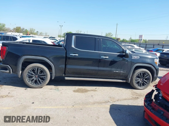 2020 GMC Sierra 1500 Denali with VIN 1GTU9FEL0LZ369793, listed as a IAAI auction lot 41870341 with 81,959 mi miles and . Bid and sale history available at DreamBid. Image 13.