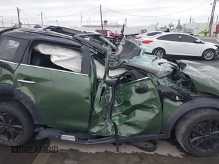 2015 MINI Countryman z VIN WMWZB3C59FWR43209, wystawiony jako IAAI lot #41761218 z przebiegiem Nie podano mil oraz . Historia ofert i sprzedaży dostępna na DreamBid. Obrazek 13.