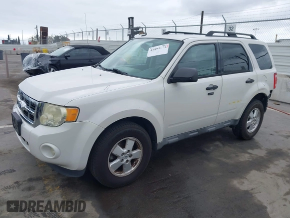 2011 Ford Escape XLT with VIN 1FMCU0D79BKA38578, listed as a IAAI auction lot 41895971 with 223,689 mi miles. Bid and sale history available at carsss.com. Image 2.