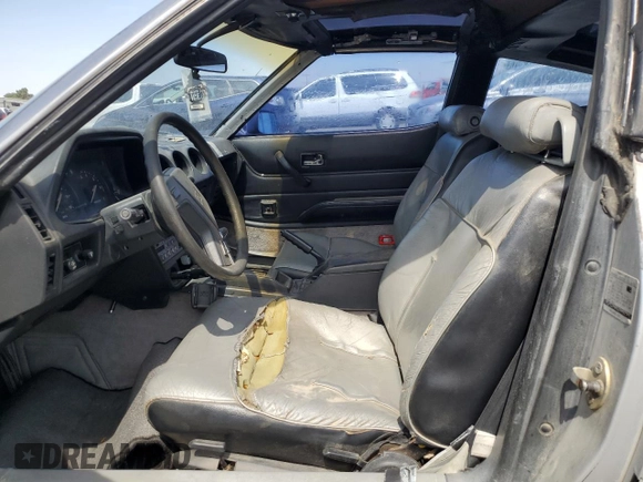 1982 Datsun 280ZX z VIN JN1HZ04SXCX448748, wystawiony jako Copart lot #87670125 z przebiegiem 136 264 mil mil oraz Szkody całkowita. Historia ofert i sprzedaży dostępna na DreamBid. Obrazek 7.