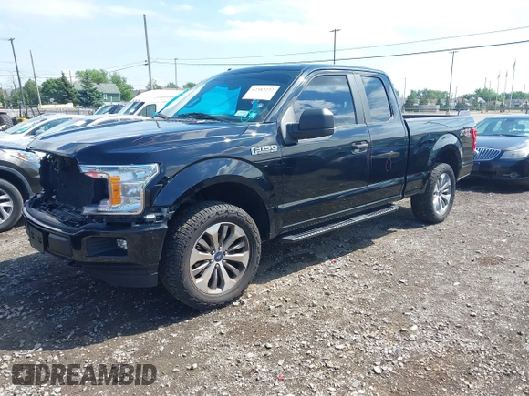 2018 Ford F-150 XL with VIN 1FTEX1EP5JKG01004, listed as a IAAI auction lot 42583232 with 123,258 mi miles and . Bid and sale history available at DreamBid. Image 17.