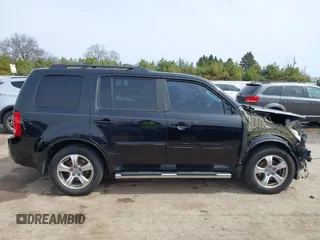 2014 Honda Pilot EX-L with VIN 5FNYF4H57EB009635, listed as a IAAI auction lot 41915219 with 272,017 mi miles. Bid and sale history available at carsss.com. Image 14.