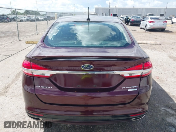 2017 Ford Fusion Titanium with VIN 3FA6P0K97HR214485, listed as a IAAI auction lot 40208619 with 39,265 mi miles and . Bid and sale history available at DreamBid. Image 16.