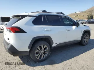 2024 Toyota RAV4 Hybrid XLE Premium with VIN JTMB6RFV6RD120633, listed as a Copart auction lot 57620825 with 28,817 mi miles and Salvage title. Bid and sale history available at DreamBid. Image 3.