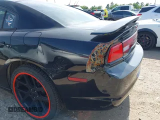 2011 Dodge Charger SE z VIN 2B3CL3CGXBH513481, wystawiony jako IAAI lot #42287564 z przebiegiem 193 875 mil mil oraz . Historia ofert i sprzedaży dostępna na DreamBid. Obrazek 6.