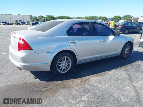 2011 Ford Fusion S with VIN 3FAHP0GA1BR316318, listed as a IAAI auction lot 41824086 with 122,229 mi miles. Bid and sale history available at carsss.com. Image 4.