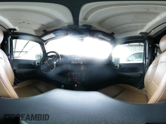 2021 Jeep Wrangler Unlimited Rubicon with VIN 1C4JJXFM6MW538774, listed as a IAAI auction lot 42368651 with 49,490 mi miles and . Bid and sale history available at DreamBid. Image 18.