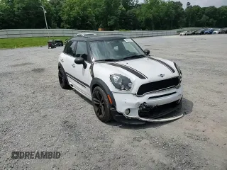 2014 MINI Countryman S with VIN WMWZC3C53EWP27156, listed as a Copart auction lot 59579765 with 159,308 mi miles and Salvage title. Bid and sale history available at DreamBid. Image 13.