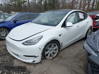 2023 Tesla Model Y Long Range with VIN 7SAYGDEE2PA145398, listed as a IAAI auction lot 41546573 with 20,812 mi miles and . Bid and sale history available at carsss.com. Image 18.