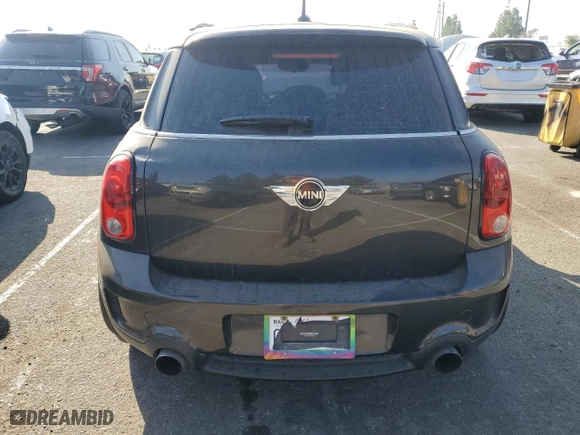2015 MINI Cooper Countryman S with VIN WMWZC3C59FWT03319, listed as a Copart auction lot 79774934 with 151,556 mi miles and Salvage Title. Bid and sale history available at carsss.com. Image 6.