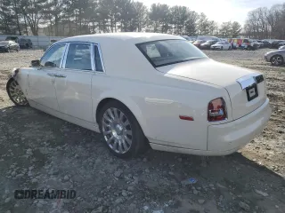 2004 Rolls-Royce Phantom z VIN SCA1S68414UX07249, wystawiony jako Copart lot #88060075 z przebiegiem Nie podano mil oraz Szkody całkowita. Historia ofert i sprzedaży dostępna na DreamBid. Obrazek 2.