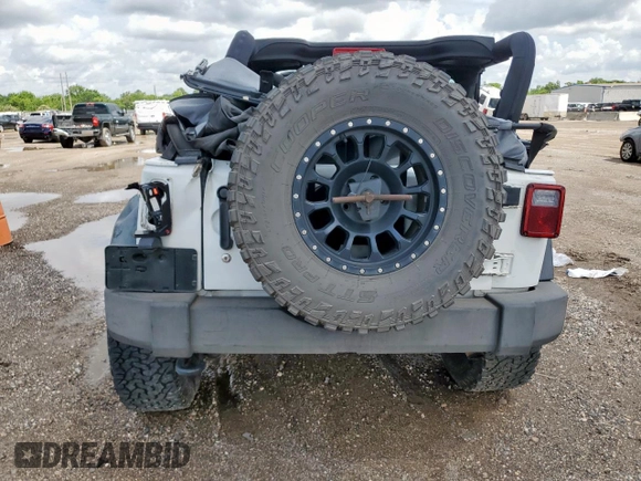 2016 Jeep Wrangler Sport с VIN 1C4AJWAG4GL262936, выставлен на аукционе Copart как лот 63928545 с пробегом 108 399 миль миль и Списание • Salvage title. История ставок и продаж доступна на DreamBid. Изображение 6.