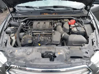 2018 Ford Taurus SEL with VIN 1FAHP2E80JG138693, listed as a IAAI auction lot 41679603 with 110,701 mi miles. Bid and sale history available at carsss.com. Image 10.