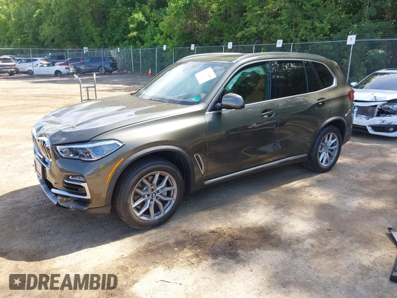 2021 BMW X5 xDrive40i with VIN 5UXCR6C06M9G21960, listed as a IAAI auction lot 42315496 with 41,580 mi miles and . Bid and sale history available at DreamBid. Image 2.