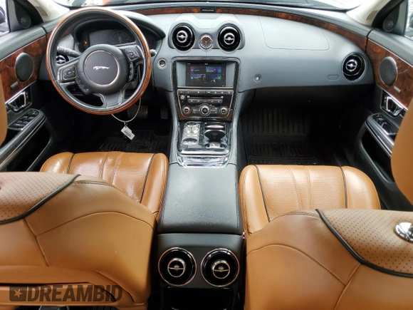 2017 Jaguar XJ R-Sport with VIN SAJWA1C70H8W05558, listed as a Copart auction lot 59759165 with 102,230 mi miles and Salvage title. Bid and sale history available at DreamBid. Image 8.