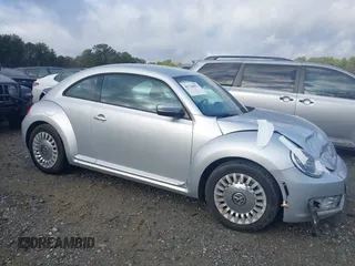 2016 Volkswagen Beetle SE с VIN 3VWJ17AT3GM606917, выставлен на аукционе IAAI как лот 41728053 с пробегом Не указан миль и . История ставок и продаж доступна на DreamBid. Изображение 13.