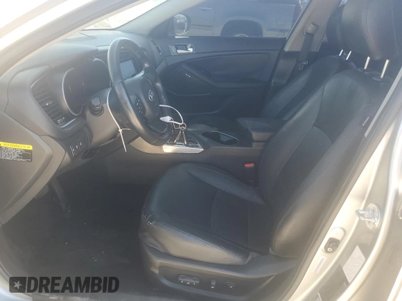2014 Kia Optima Hybrid EX with VIN KNAGN4AD9E5073139, listed as a Copart auction lot 77374134 with 189,519 mi miles and Clean Title. Bid and sale history available at carsss.com. Image 7.