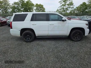2018 Chevrolet Tahoe Commercial z VIN 1GNSKDEC6JR359306, wystawiony jako Copart lot #57100015 z przebiegiem 154 075 mil mil oraz Czysty tytuł • Clean title. Historia ofert i sprzedaży dostępna na DreamBid. Obrazek 14.