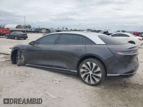 2023 Lucid Air Grand Touring z VIN 50EA1GBA8PA001431, wystawiony jako Copart lot #75683014 z przebiegiem 12 117 mil mil oraz Szkody całkowita. Historia ofert i sprzedaży dostępna na DreamBid. Obrazek 2.