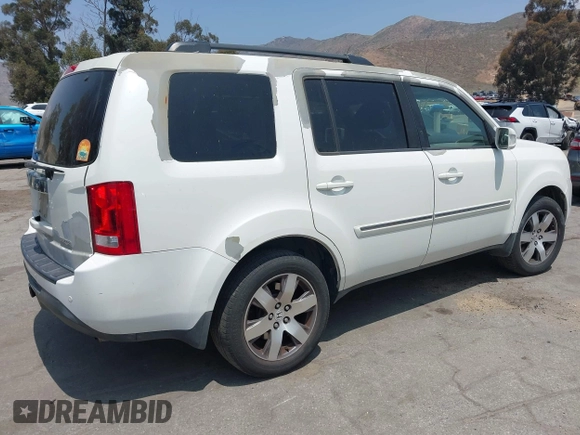 2013 Honda Pilot Touring with VIN 5FNYF3H93DB017954, listed as a IAAI auction lot 42185556 with 174,929 mi miles and . Bid and sale history available at carsss.com. Image 4.