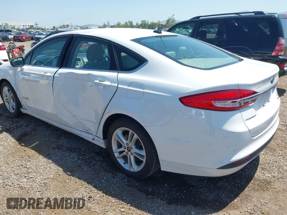2018 Ford Fusion SE z VIN 3FA6P0LU2JR261268, wystawiony jako IAAI lot #42301578 z przebiegiem 63 357 mil mil oraz . Historia ofert i sprzedaży dostępna na DreamBid. Obrazek 3.