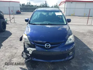 2009 Mazda 5 Sport with VIN JM1CR29L390355978, listed as a IAAI auction lot 41609117 with 118,588 mi miles and . Bid and sale history available at DreamBid. Image 12.