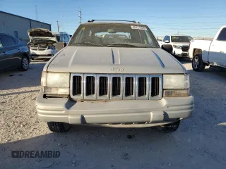 1998 Jeep Grand Cherokee with VIN 1J4FX48S4WC345469, listed as a Copart auction lot 80721224 with 201,543 mi miles and Salvage title. Bid and sale history available at DreamBid. Image 5.