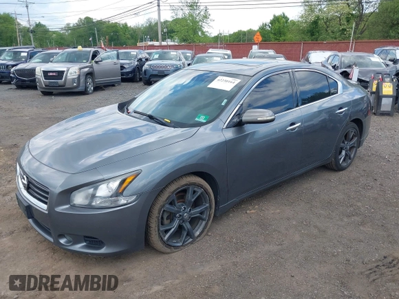 2014 Nissan Maxima S with VIN 1N4AA5AP9EC432415, listed as a IAAI auction lot 42230164 with 149,080 mi miles and . Bid and sale history available at DreamBid. Image 6.