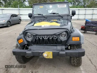 2005 Jeep Wrangler Unlimited with VIN 1J4FA44S75P358246, listed as a Copart auction lot 60958695 with 150,003 mi miles and Salvage title. Bid and sale history available at DreamBid. Image 5.