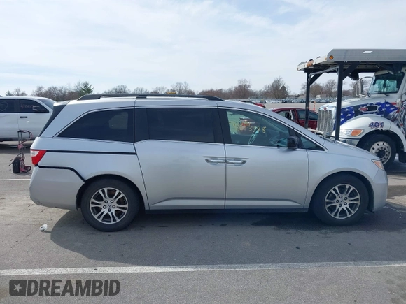 2011 Honda Odyssey EX с VIN 5FNRL5H47BB082302, выставлен на аукционе IAAI как лот 41853348 с пробегом 179 026 миль миль и . История ставок и продаж доступна на DreamBid. Изображение 13.