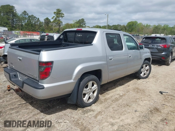 2014 Honda Ridgeline RTL with VIN 5FPYK1F53EB013752, listed as a IAAI auction lot 41886851 with 89,038 mi miles and . Bid and sale history available at DreamBid. Image 4.