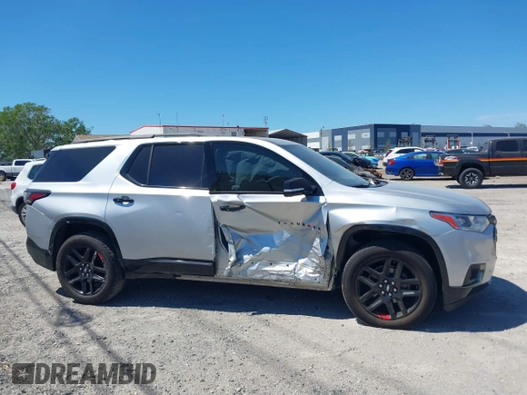 2020 Chevrolet Traverse Premier with VIN 1GNERKKW2LJ278087, listed as a IAAI auction lot 41891671 with 59,172 mi miles and . Bid and sale history available at DreamBid. Image 14.