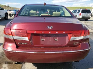 2009 Hyundai Azera GLS z VIN KMHFC46D99A351155, wystawiony jako Copart lot #56517695 z przebiegiem 176 311 mil mil oraz Szkoda całkowita • Salvage title. Historia ofert i sprzedaży dostępna na DreamBid. Obrazek 6.