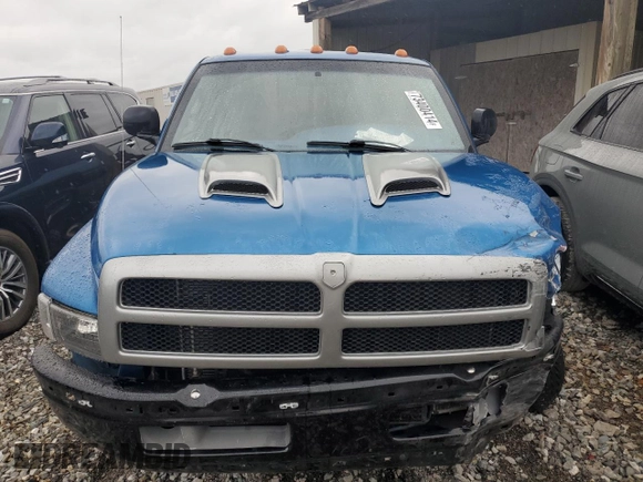 2000 Dodge 2500 with VIN 1B7KF23W7YJ120158, listed as a Copart auction lot 73400414 with 174,004 mi miles and Clean title. Bid and sale history available at DreamBid. Image 5.