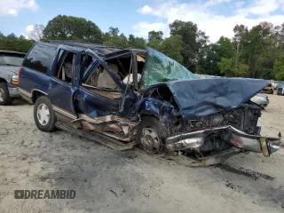 1998 GMC Yukon with VIN 1GKEK13R8WJ722890, listed as a Copart auction lot 72904114 with 243,711 mi miles and Salvage Title. Bid and sale history available at carsss.com. Image 4.